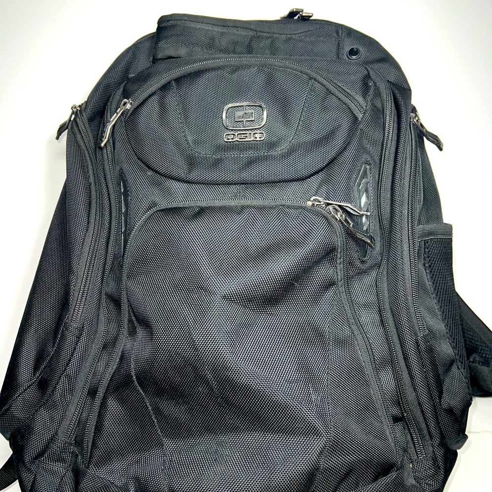 LARGE OGIO Backpack will hold and protect a laptop-with many pockets